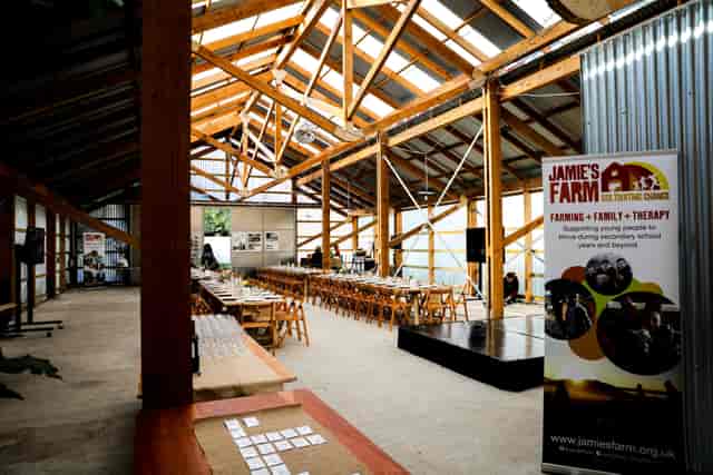 Rustic event venue with wooden beams for gatherings at Oasis Farm Waterloo.