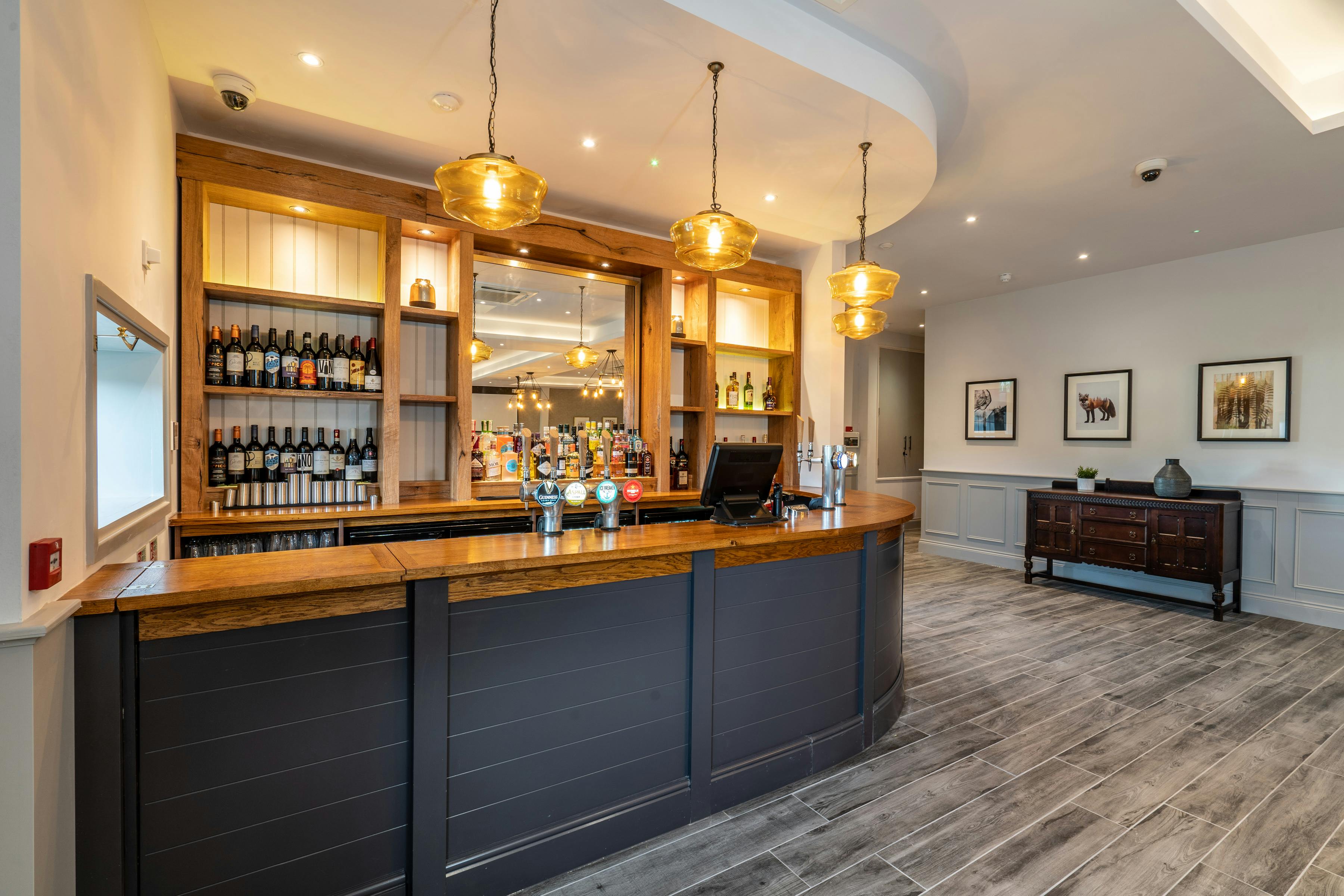 Elegant bar area at The Barn, perfect for networking events and receptions.