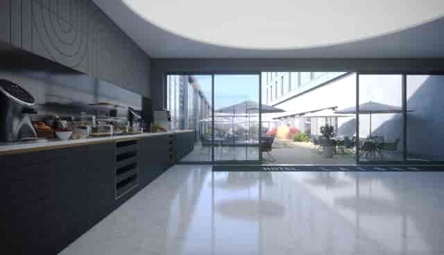 Modern meeting space with large windows at Hotel La Tour for networking events.
