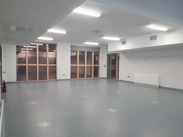 Western Meeting Hall: bright, versatile event space for meetings and workshops.
