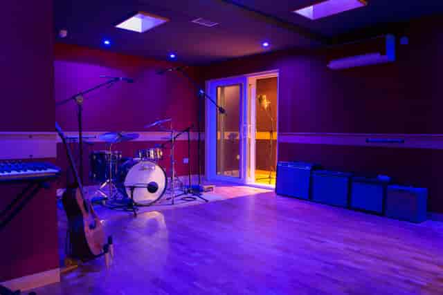 Vibrant Dock Street Studio venue with stage, ideal for music events and workshops.