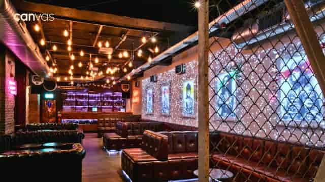 The Canvas venue, urban-chic booth seating, corporate event and networking mixer.