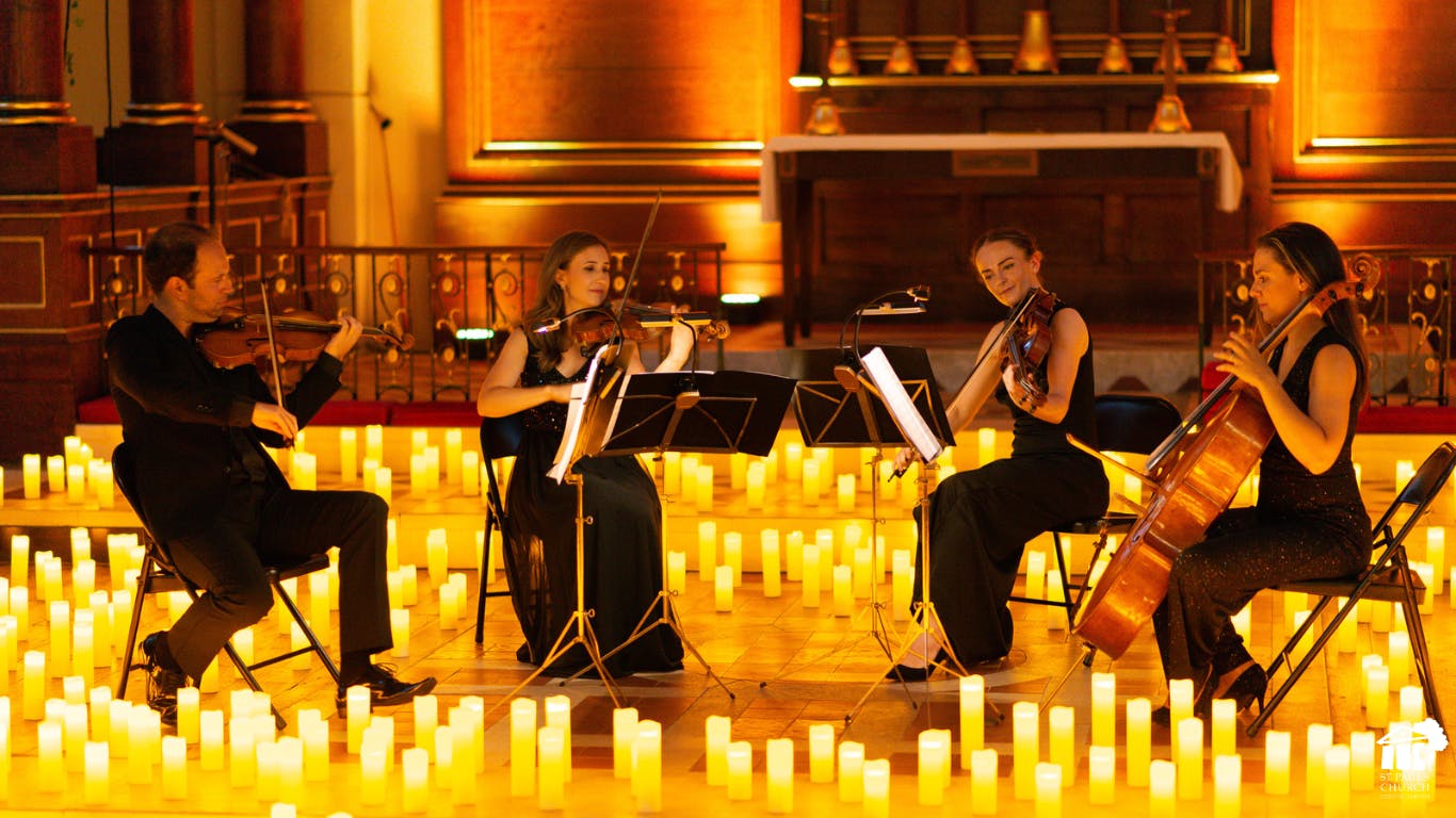 String quartet performing in elegant St Paul's Church, perfect for upscale weddings and events.