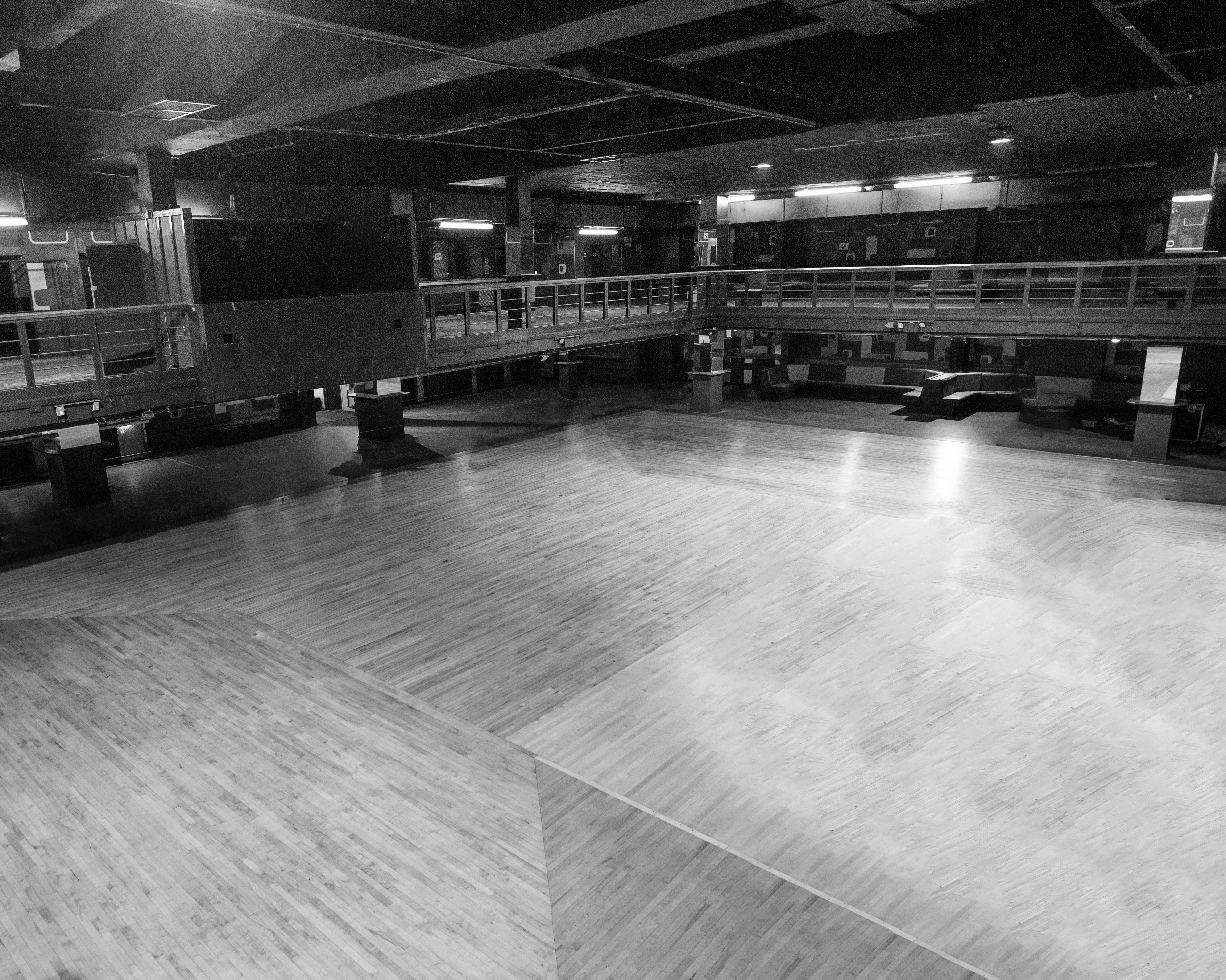 Spacious event venue with polished wooden floors in Forum HQ Birmingham for exhibitions and performances. - Banner