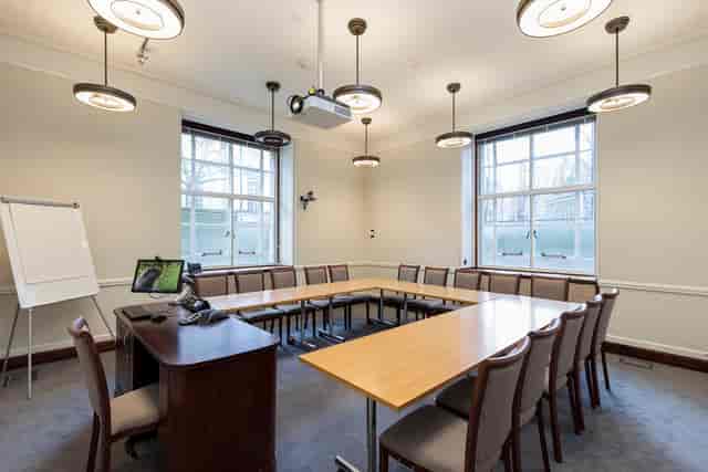 Meeting room at University of London, featuring a large table for professional events.