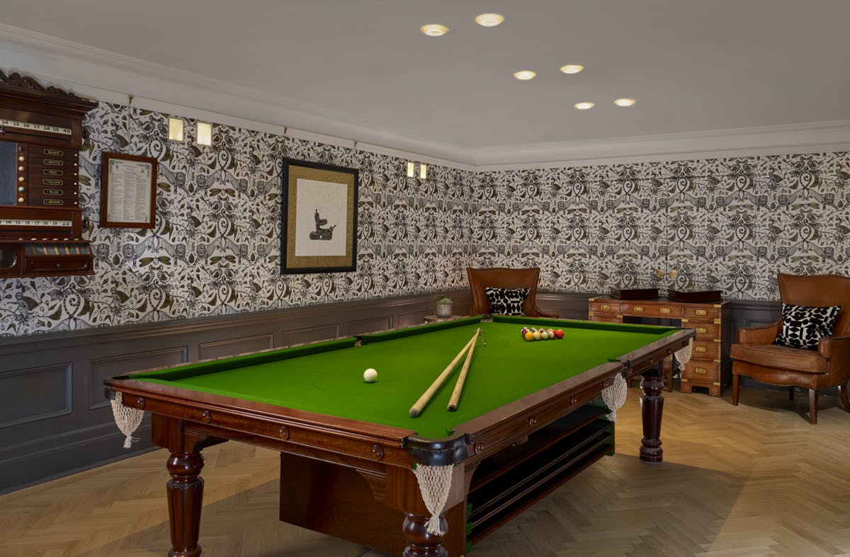 Billiards Room at Holmes Hotel London, elegant decor for networking events and gatherings.