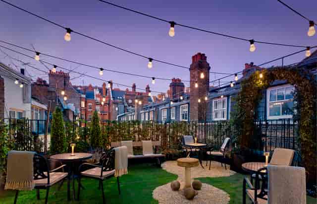 Charming rooftop venue at Holmes Hotel London, ideal for intimate gatherings and networking events.
