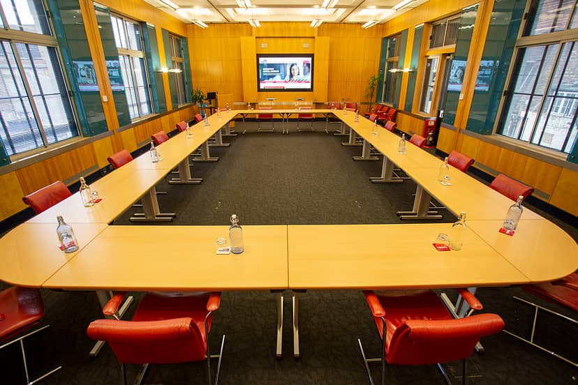Modern U-shaped conference room in Broadway House, ideal for meetings and presentations.
