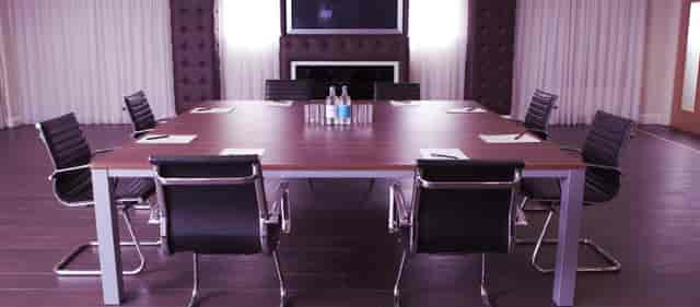 Vice President's Lounge at Selhurst Park, modern meeting room with large table and chairs.
