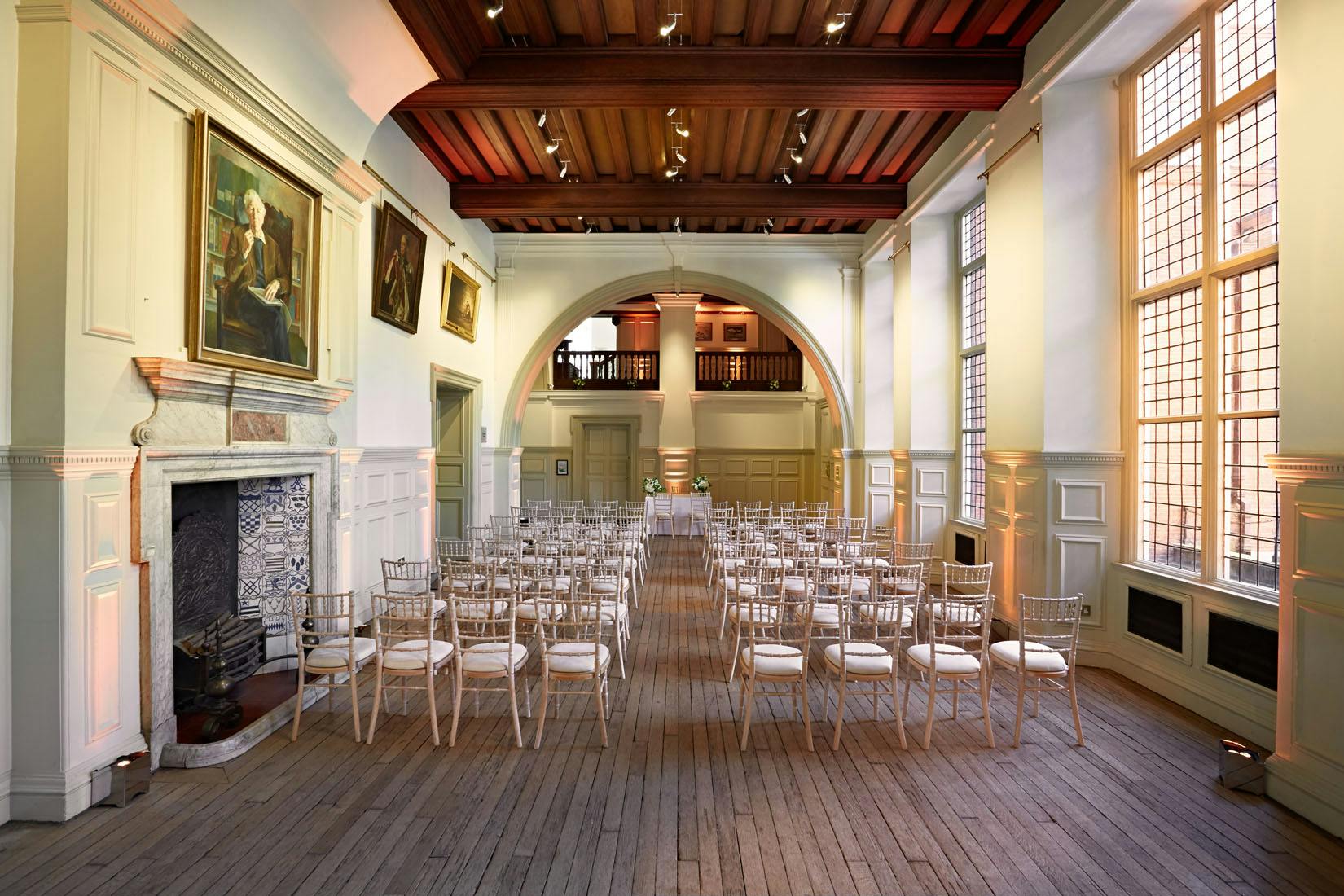 Elegant wedding venue with wooden flooring and high ceilings at Royal Geographical Society.