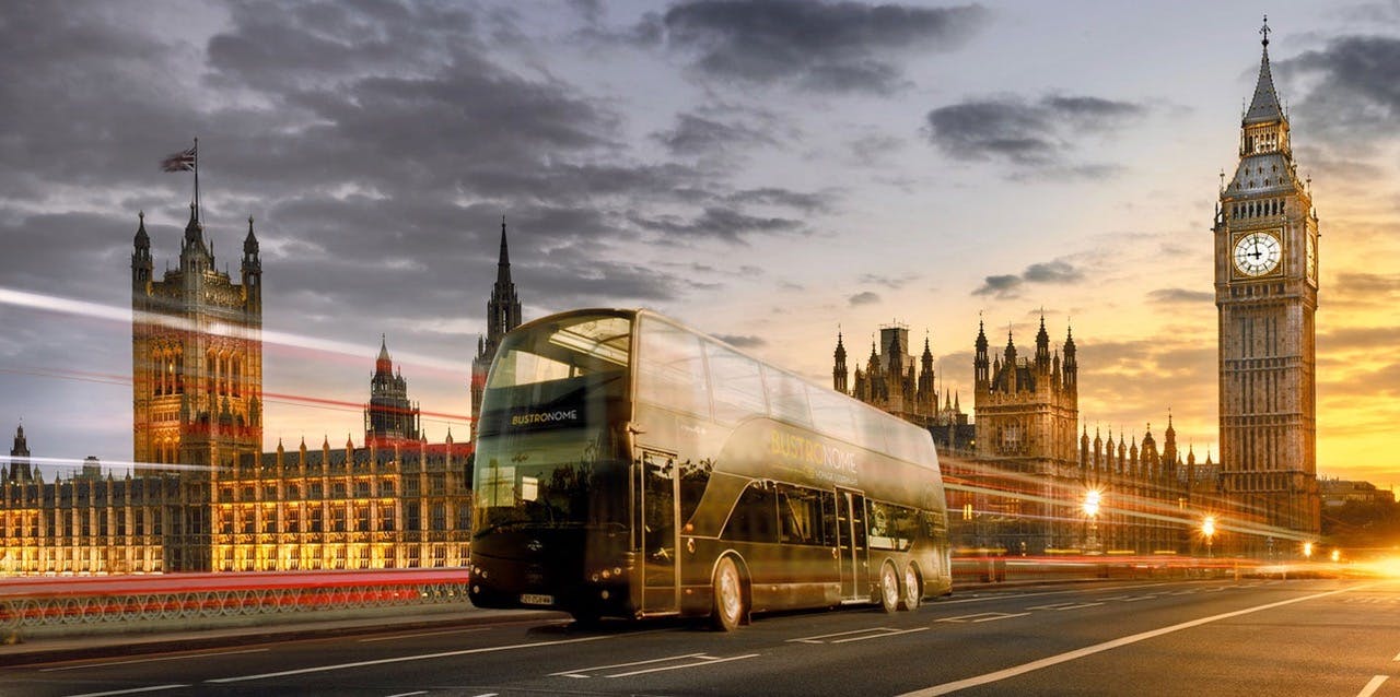 Double-decker bus near Big Ben, ideal for London city tours and event shuttles.