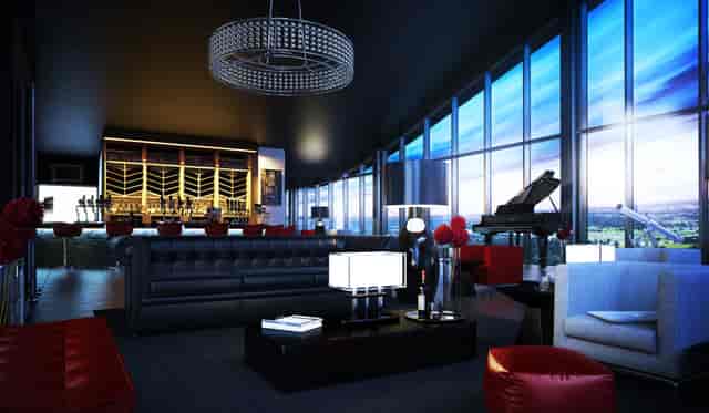 Sophisticated event space with plush seating and large windows at Hotel La Tour.