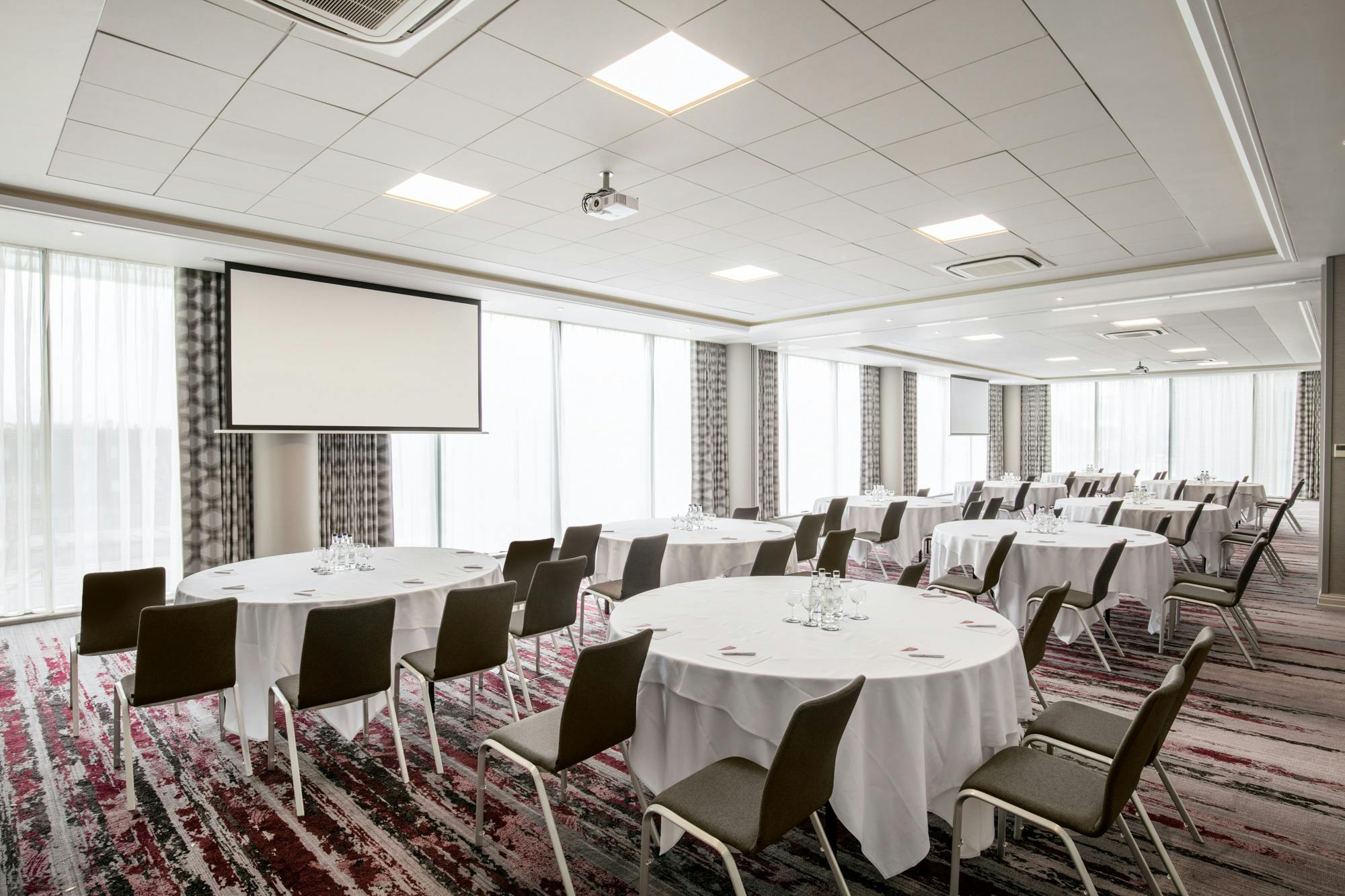 Docklands Suite at Crowne Plaza: versatile meeting space with natural light for conferences.