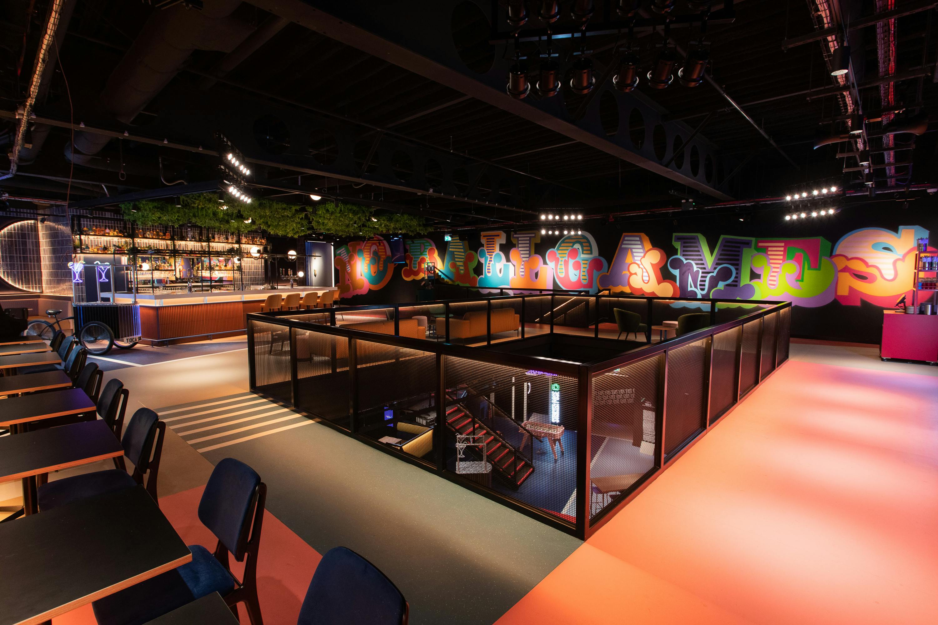 Vibrant TOCA Social venue with colorful graffiti, perfect for dynamic gatherings and events.