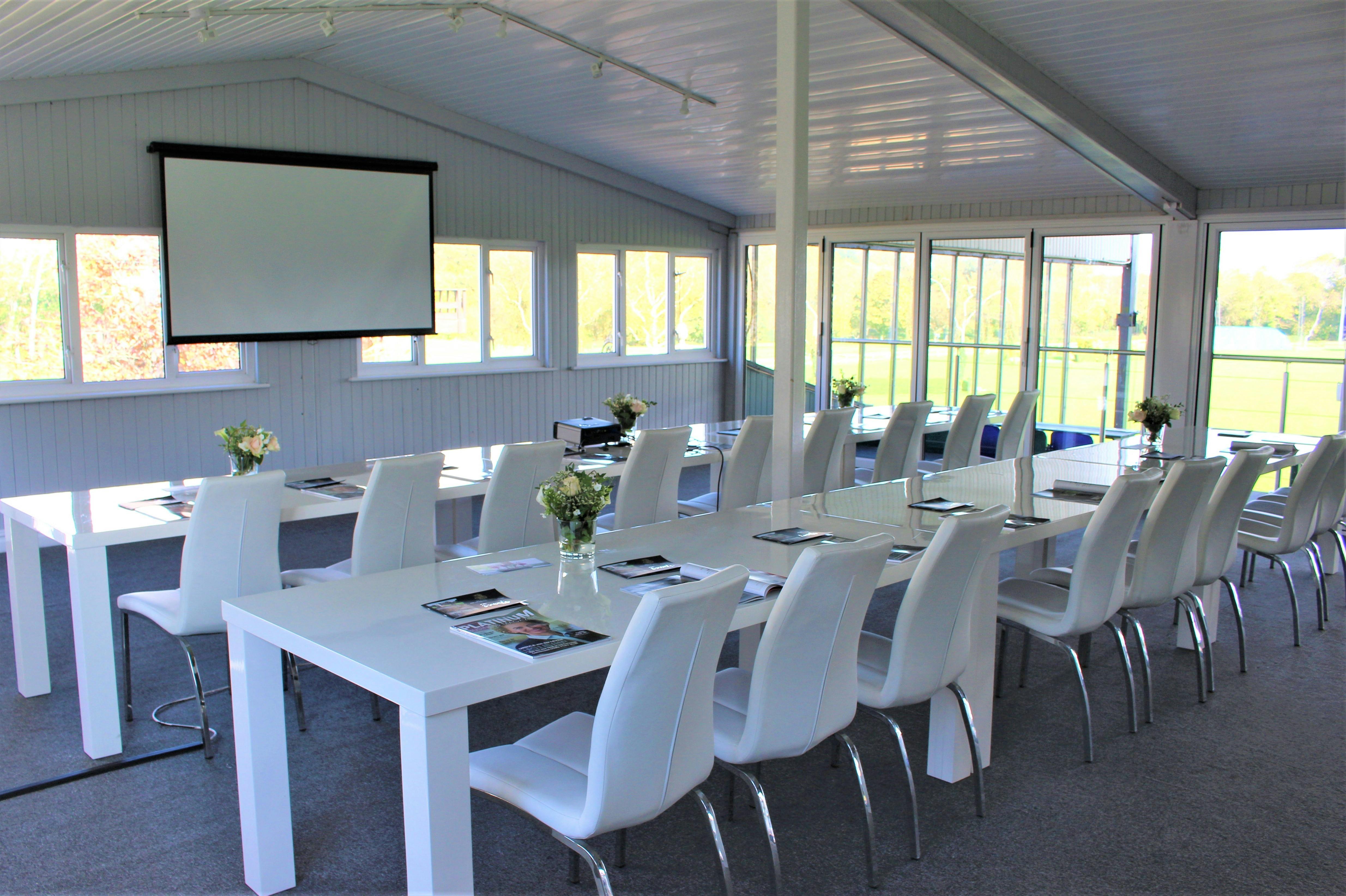 Al Shira'aa Suite at Hickstead Showground, modern meeting space with natural light and elegance.