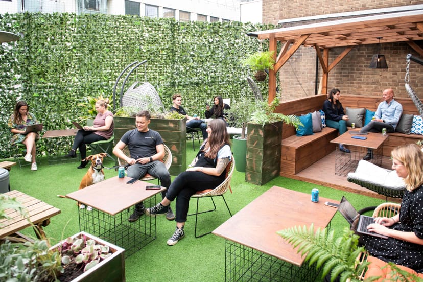 Vibrant outdoor meeting space at Runway East Soho, perfect for team-building and brainstorming.