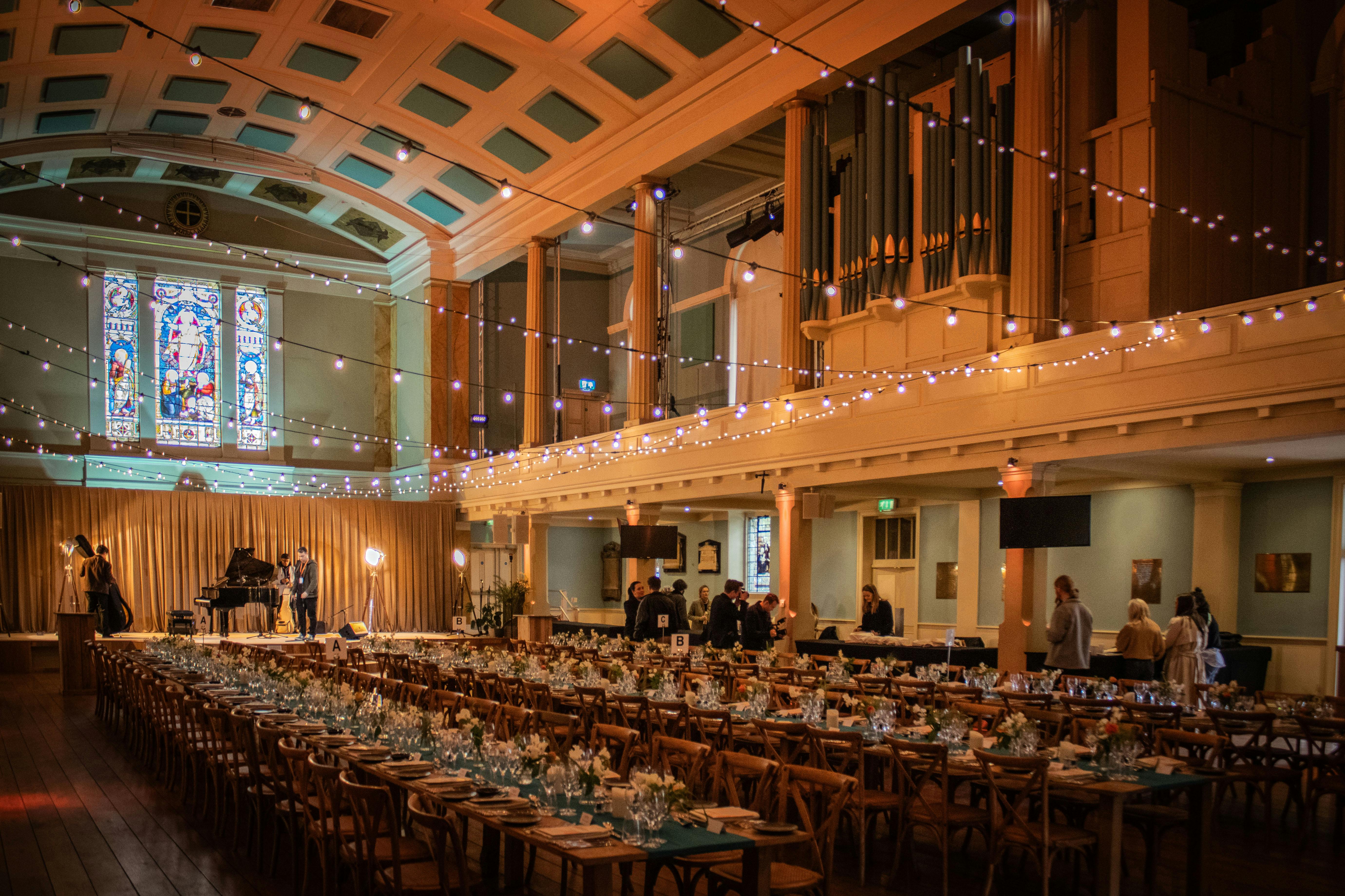 Elegant event space in St Mary's Marylebone with banquet tables, ideal for weddings and corporate events.