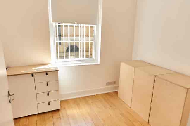 Minimalist meeting space with natural light at 67 York Street Gallery for versatile events.