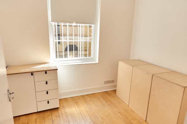 Minimalist meeting space with natural light at 67 York Street Gallery for versatile events.