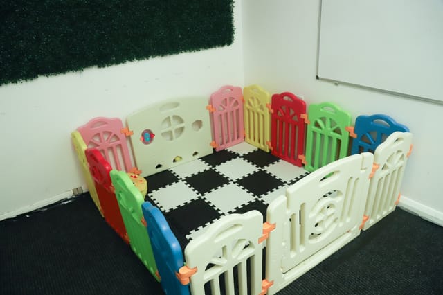 Colorful playpen at Potter's House Church Brixton for family-friendly events.