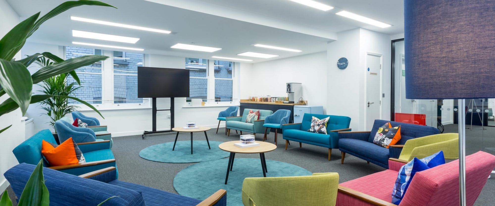 Modern meeting space with vibrant seating for workshops and brainstorming in Covent Garden.