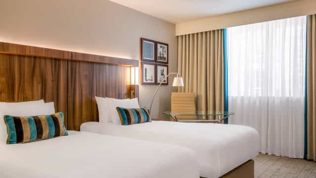 Stevenson Room at Courtyard by Marriott Edinburgh, featuring two beds for events and conferences.