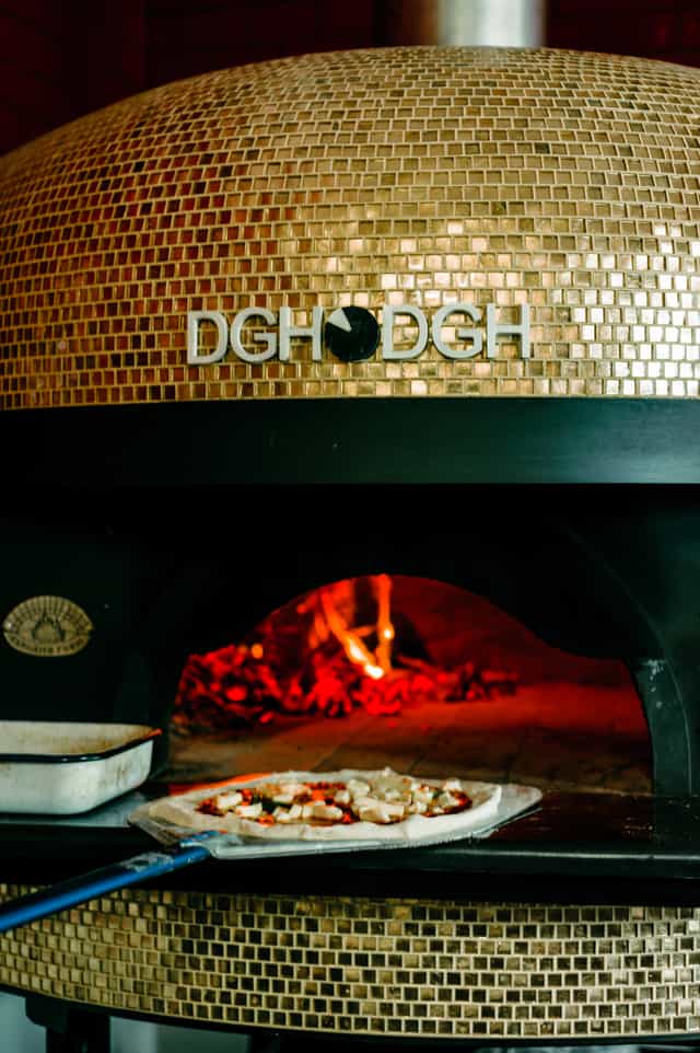 Mosaic oven in Dough Dough Liverpool, perfect for culinary events and intimate dining.