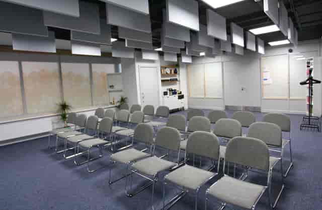 Versatile meeting space at Neal Street Espresso, ideal for workshops and presentations.
