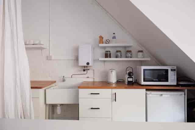 Compact kitchen in Bright Banana Studios for event catering and meetings.