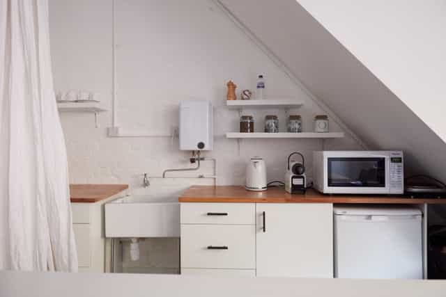 Compact kitchen in Bright Banana Studios for event catering and meetings.
