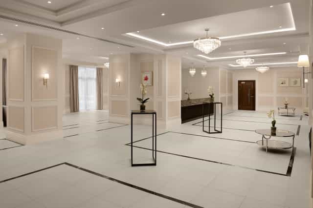 Monarch Suite at Fairmont Windsor Park: elegant event space with chandeliers for gatherings.