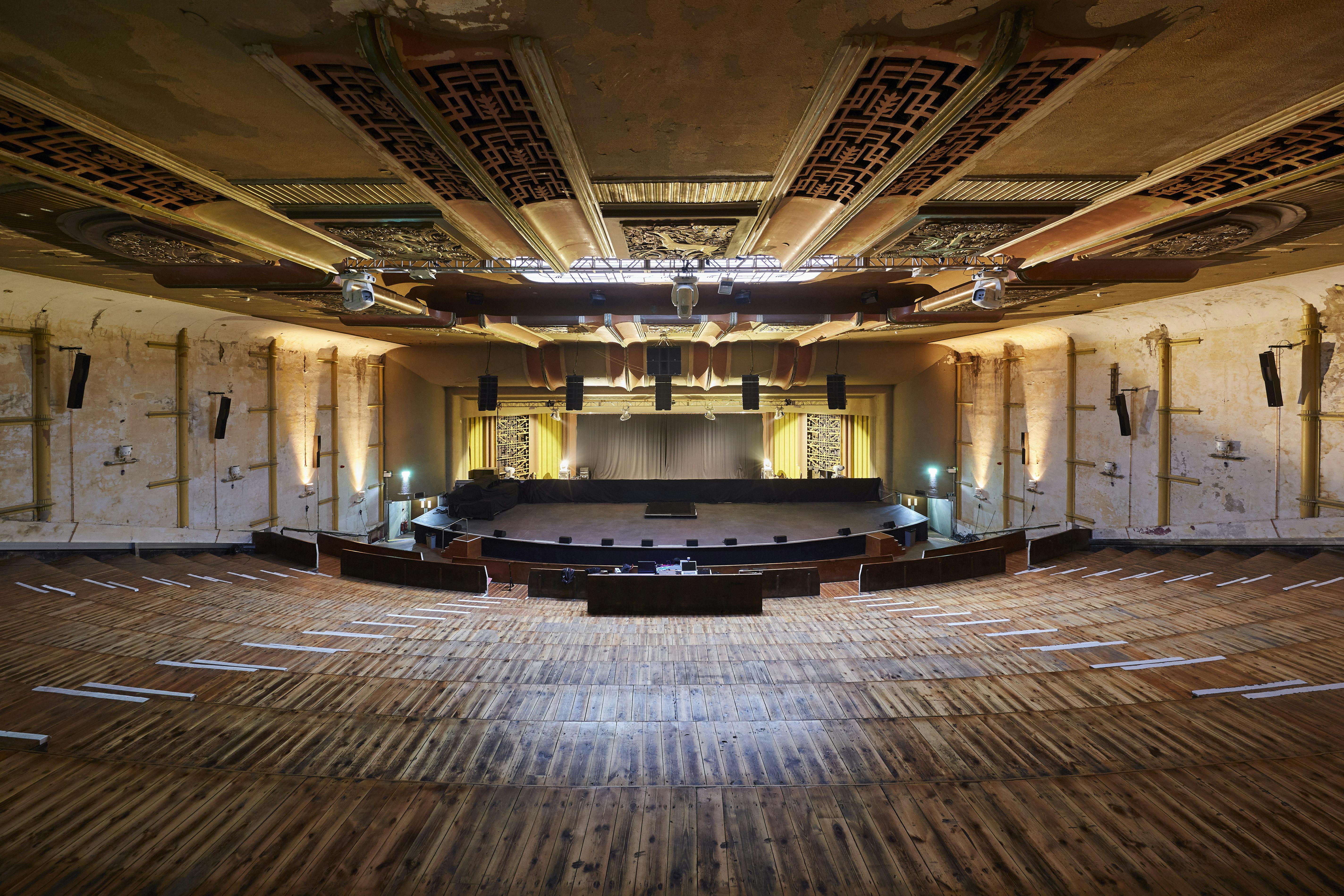 Elegant auditorium in EartH with tiered seating for conferences and performances.