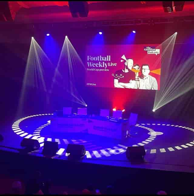 "Football Weekly Live event at EartH with vibrant lighting and interactive seating."
