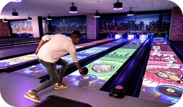 Modern bowling alley at G-Bowl, ideal for corporate events and team-building activities.
