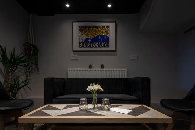 Stylish Frequency Cocktail Bar meeting space with modern furniture for intimate gatherings.