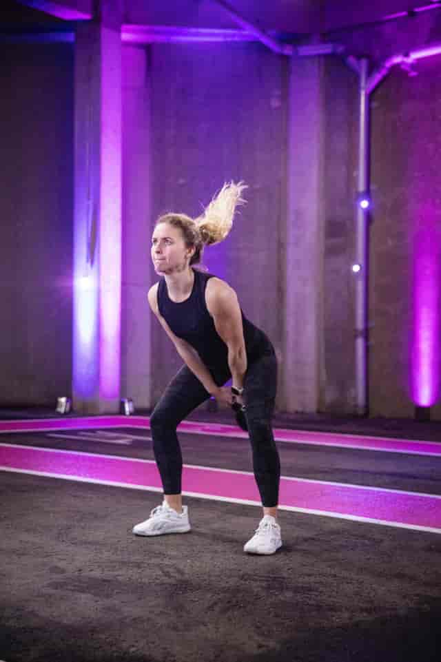 Dynamic fitness session at Pink Coach Park, Wembley Park for corporate wellness events.