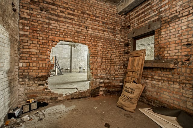 Empire Film Studios' raw industrial space with exposed brick for unique events.