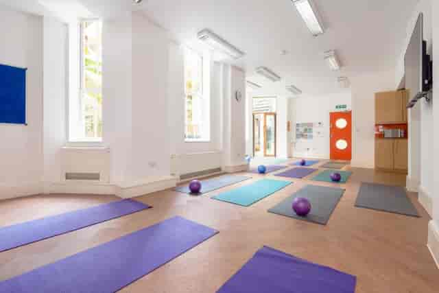 Bright yoga studio in Fitzrovia Community Centre, perfect for wellness events.