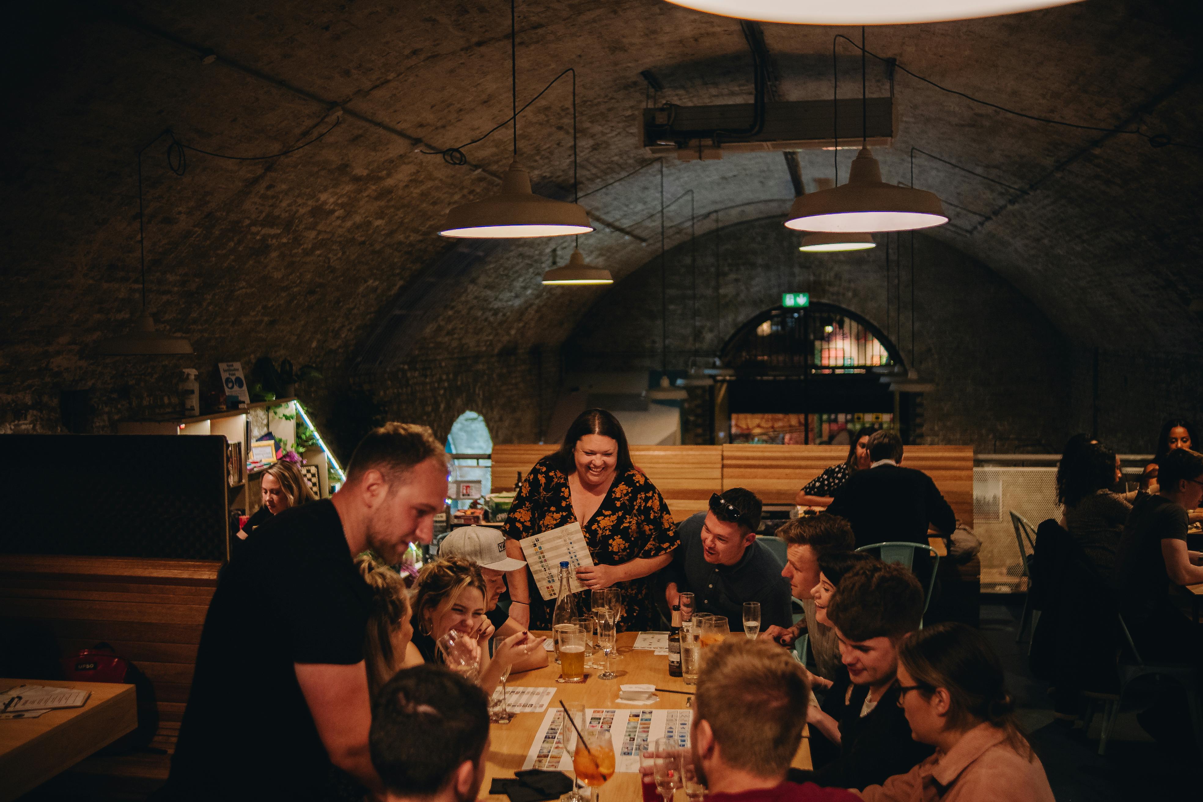 Vibrant dining setting at Mezzanine, Draughts Waterloo for networking events.