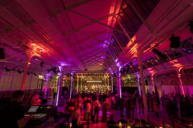 Vibrant Woolwich Works event space with dynamic lighting for successful gatherings.