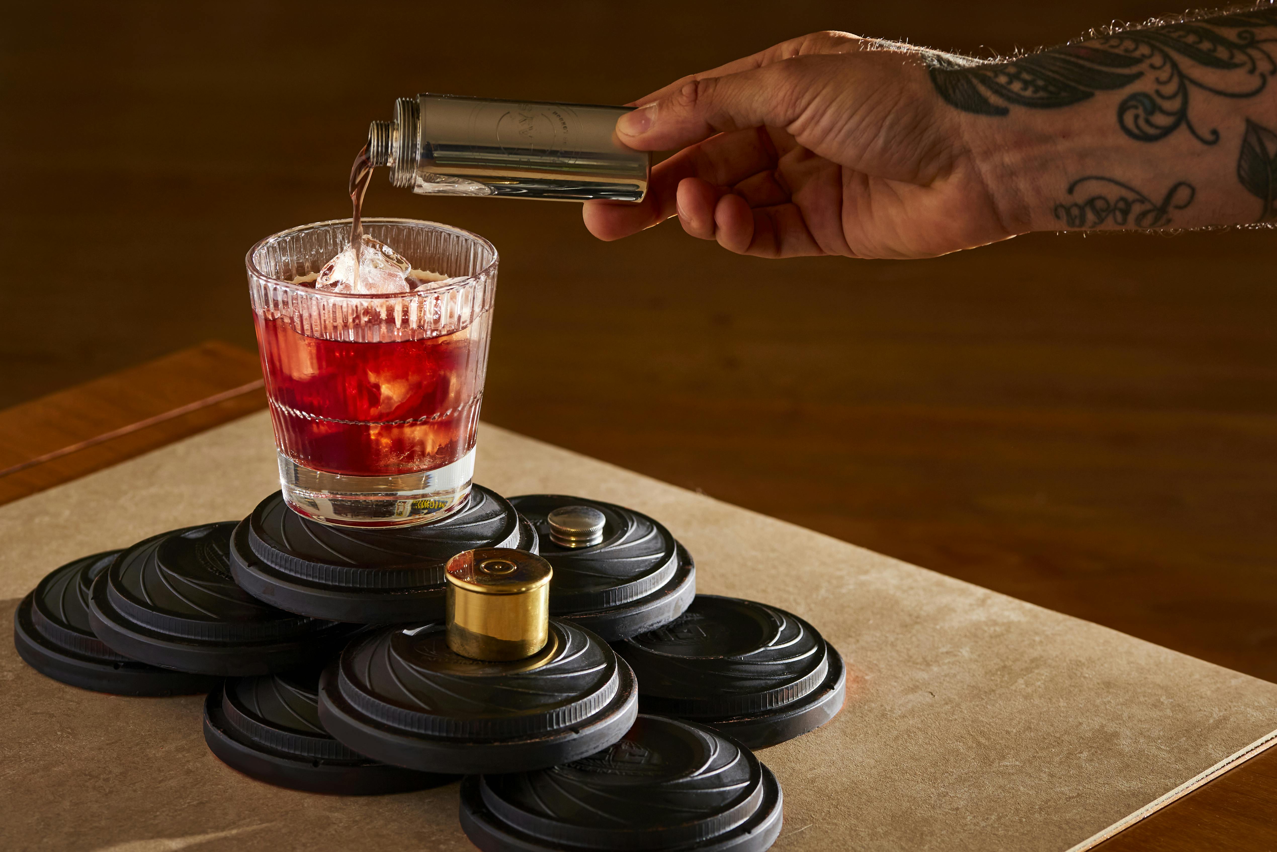 Stylish cocktail poured over ice at a sophisticated networking event in Moorgate.