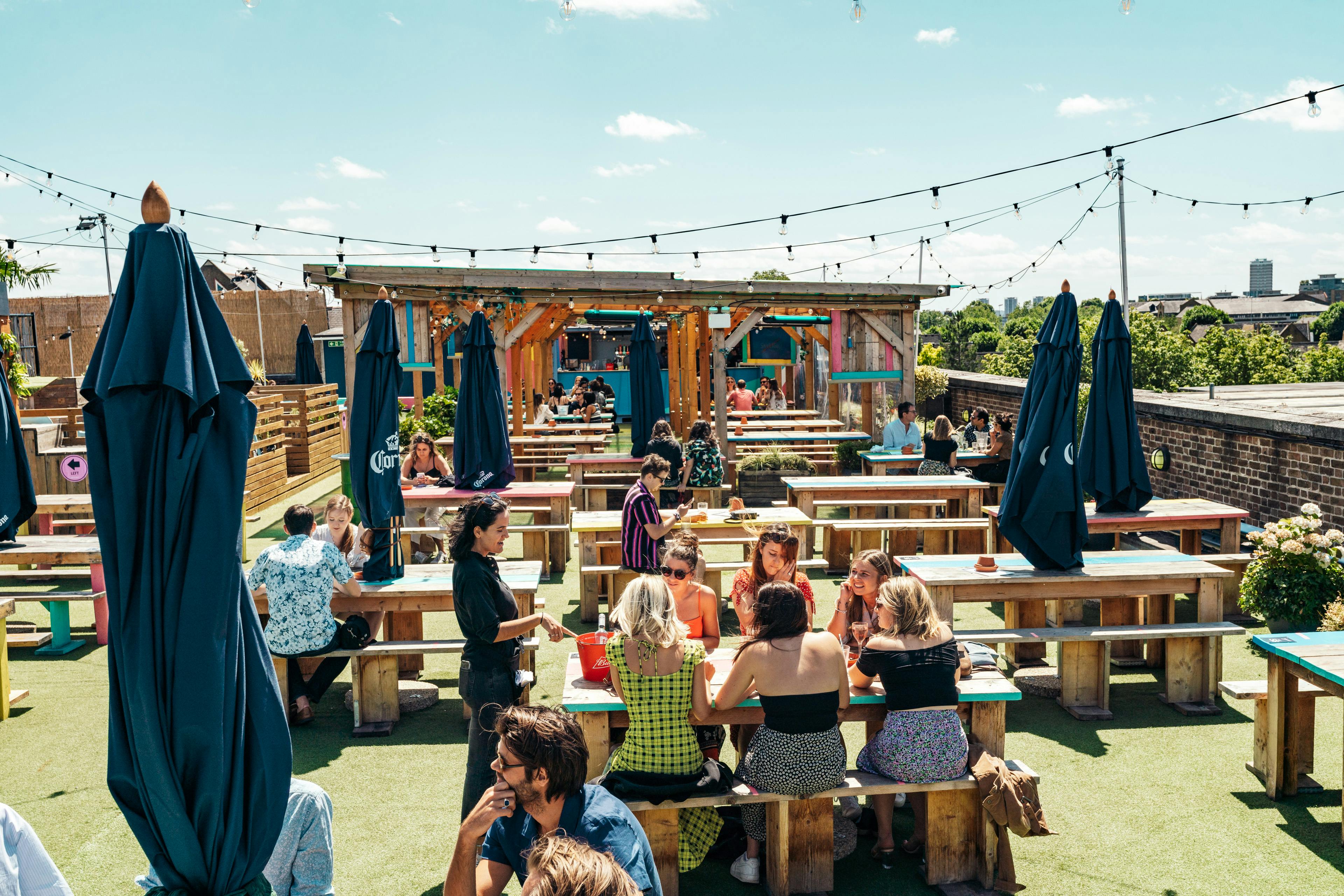 Vibrant outdoor event space at Skylight Tobacco Dock, perfect for summer gatherings.