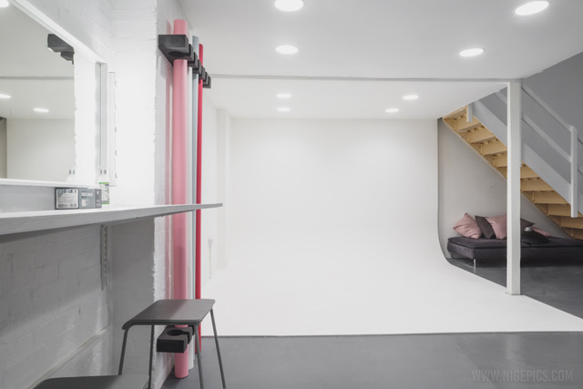 Versatile event space with minimalist design, ideal for workshops and presentations.
