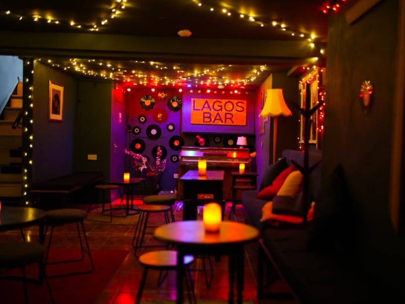 Vibrant Lagos Bar venue with warm lighting for intimate gatherings and events.