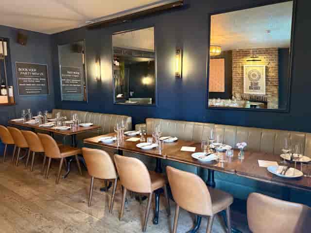 La Scala Room at Opera Tavern: Private dining space with banquette seating for luxury events.