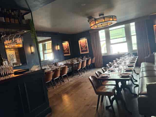 La Scala private dining room with plush banquettes for corporate banquets and exclusive dinners.