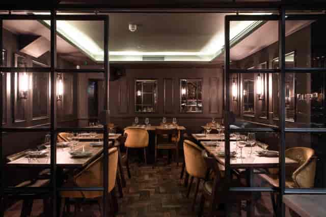 Elegant private dining room at Ember Yard, perfect for intimate gatherings and corporate dinners.