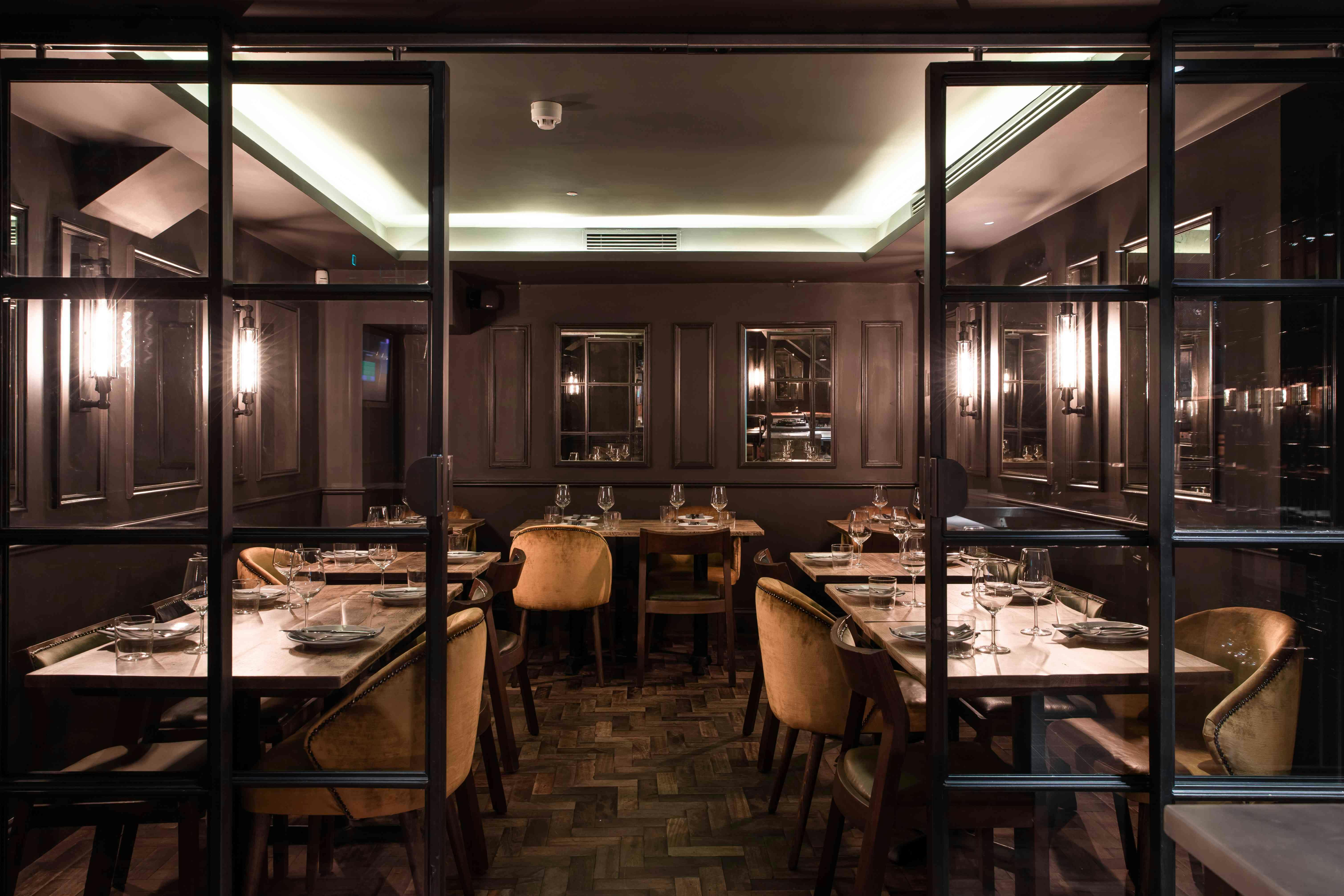 Elegant private dining room at Ember Yard, perfect for intimate gatherings and corporate events.