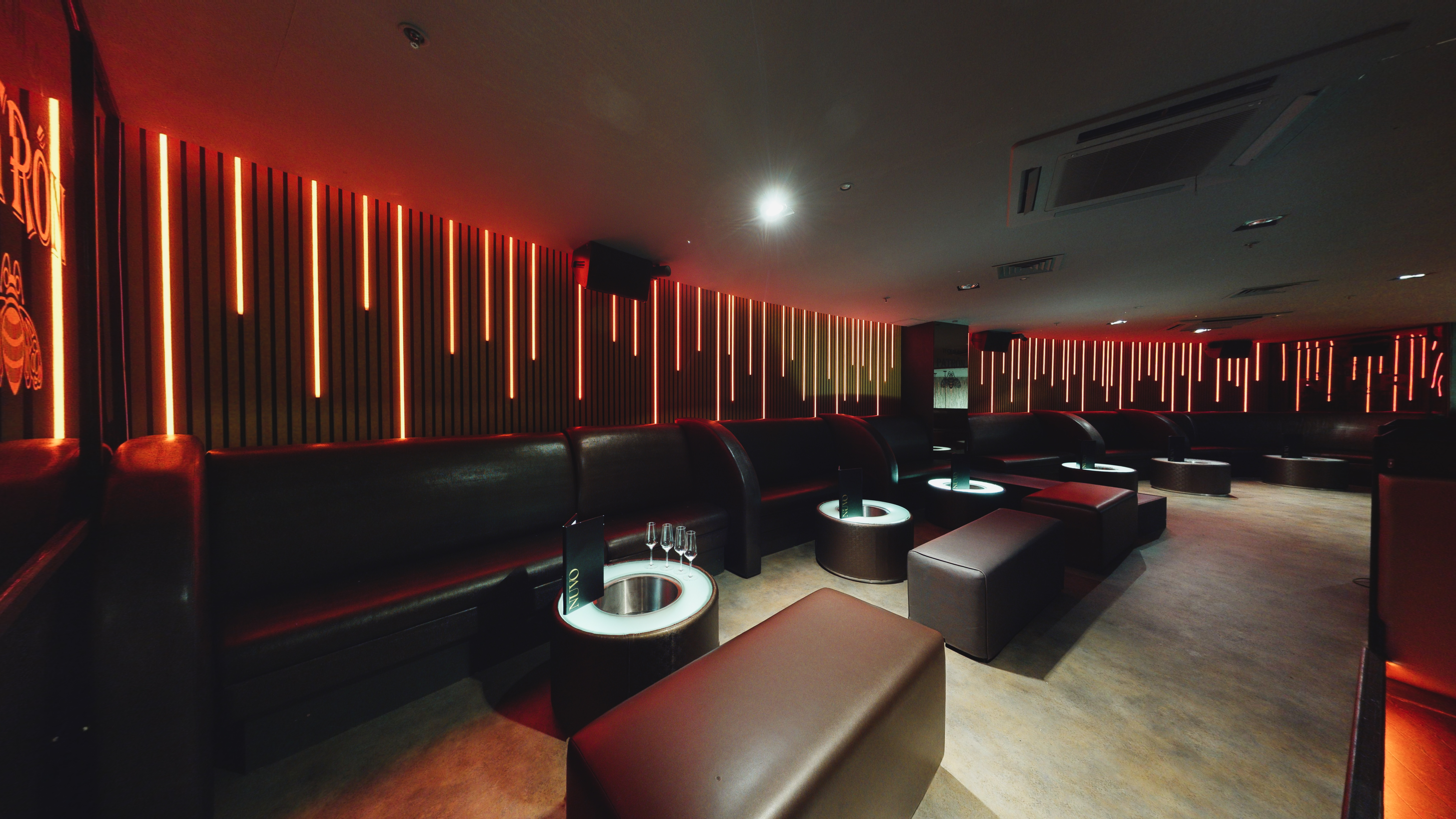 Modern Nuvo Late Lounge with red lighting, ideal for cocktail receptions and private parties.