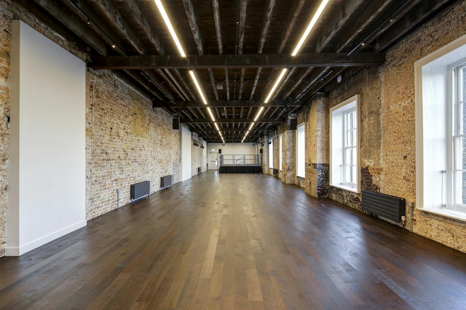 Beanfeast event space in Woolwich Works with rustic charm and modern amenities.